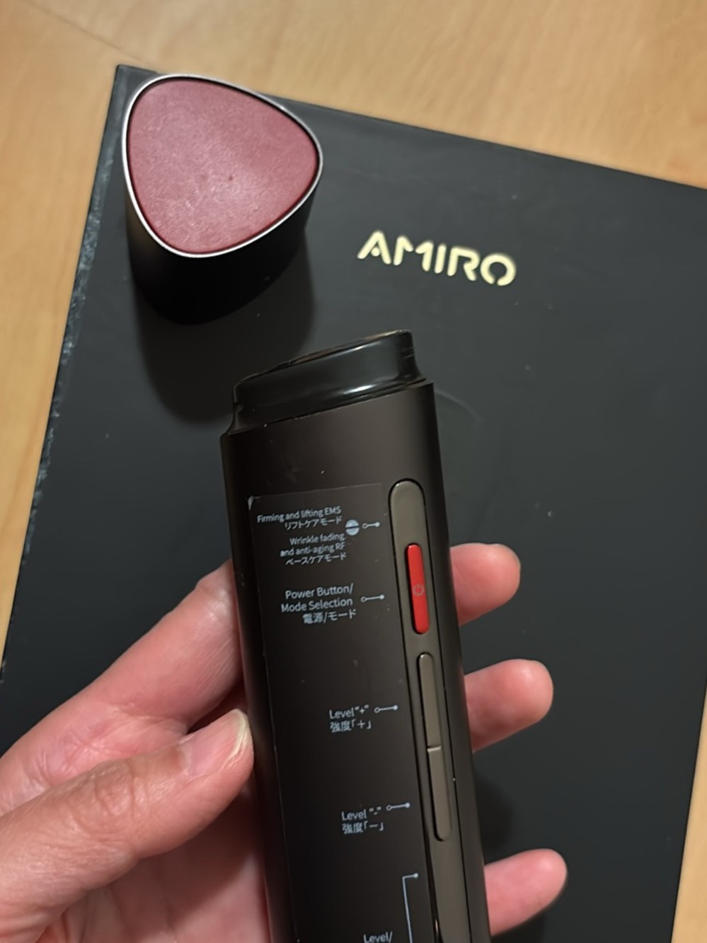 AMIRO Facial Massager Device - Black with Deep Red Accent